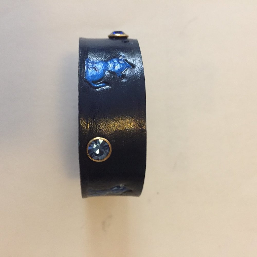 Hand tooled leather bracelet with crystals